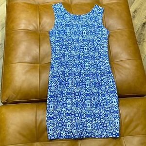 Cobalt blue and white patterned fitted dress.